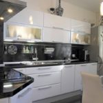Corner white and black kitchen in a modern design
