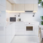 Expressive white kitchen interior with good work area lighting