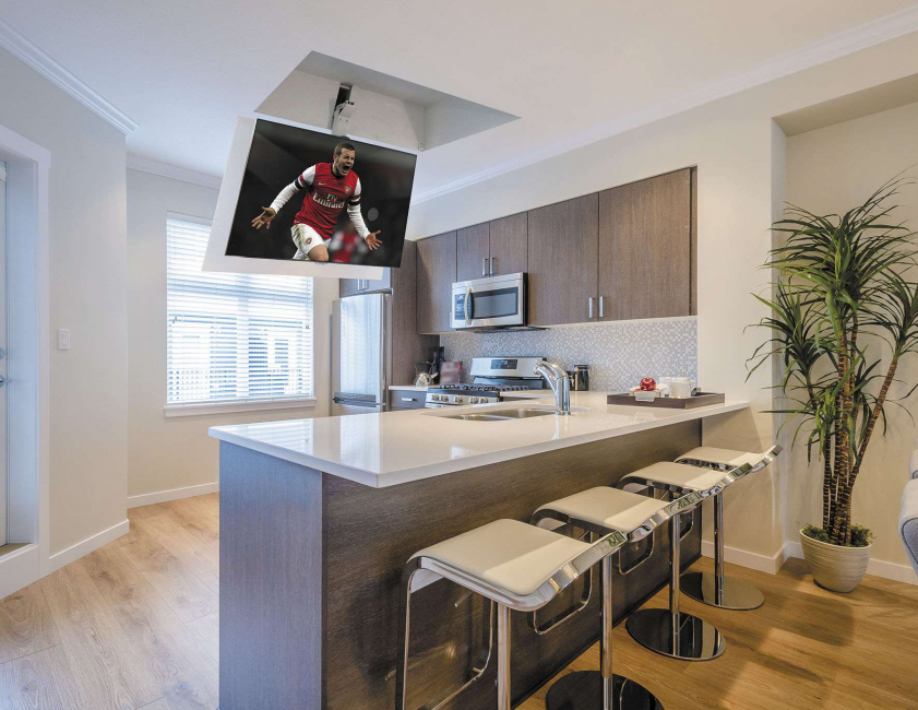 TV in the kitchen in the ceiling niche
