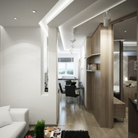 ห้องนั่งเล่นขนาดกะทัดรัดในอพาร์ทเมนต์สองห้องนอน