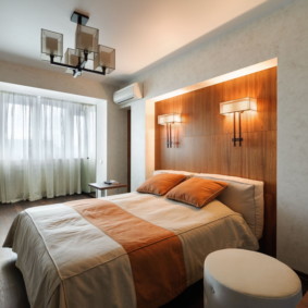 sconces ในห้องนอนเหนือภาพถ่ายสายพันธุ์เตียง